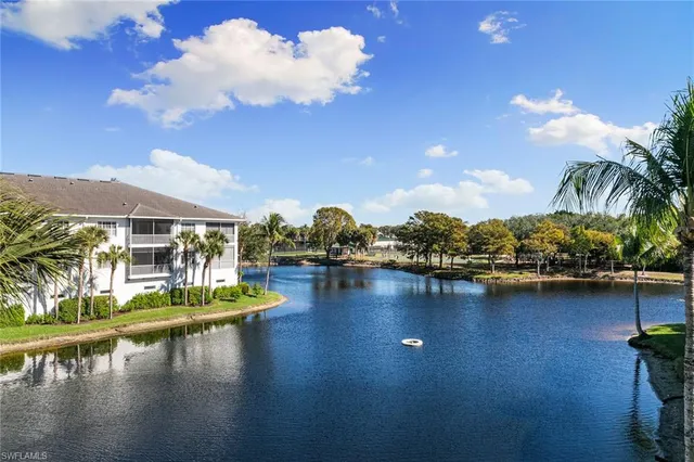 a view of a lake with houses
