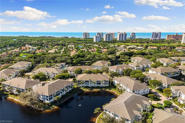 an aerial view of a city with lots of residential buildings