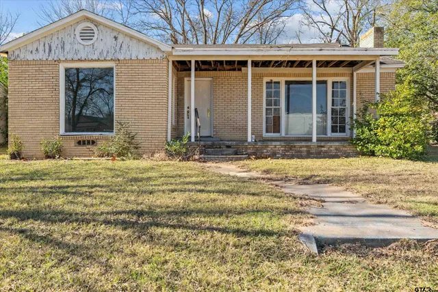 a view of a house with a swimming pool