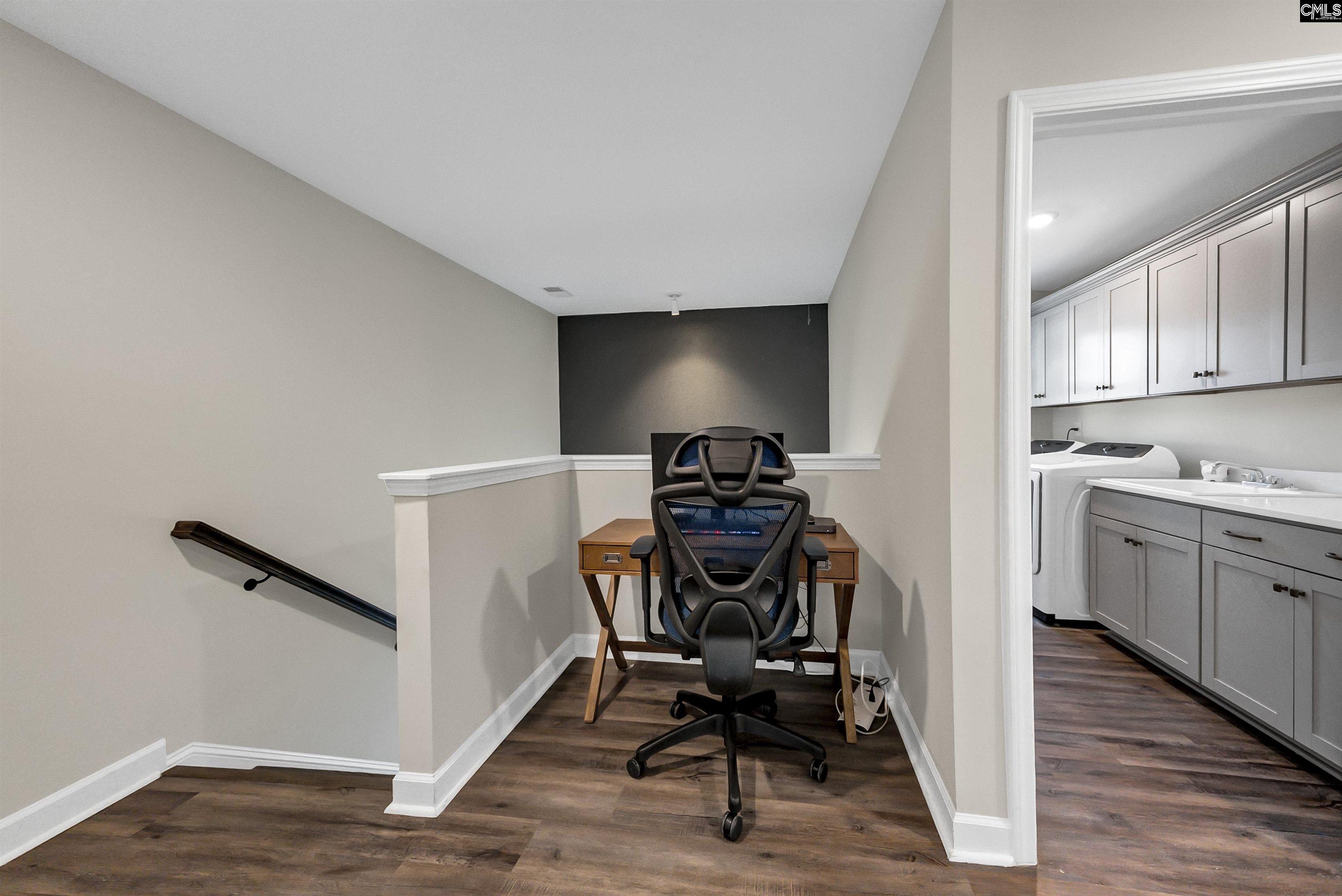 515 Malachite Lane Chapin, SC 29036 - Photo 32 of 63 a view of a workspace with furniture and wooden floor