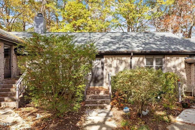 a view of swimming pool of water with green space