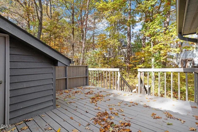a balcony view with a outdoor seating
