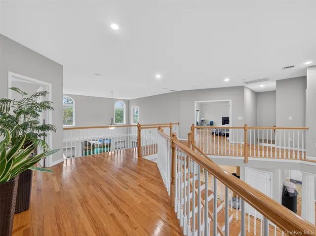 a view of entryway with wooden floor