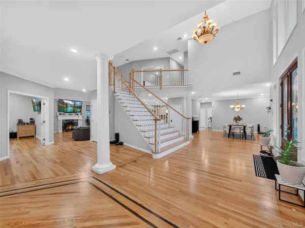 a view of a living room and wooden floor