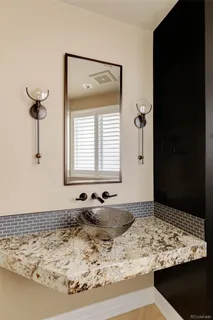 a living room with furniture or wooden floor and a window