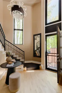 a view of a livingroom with furniture and window