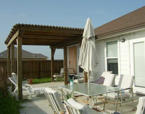 15633 Dyna Street Corpus Christi, TX 78418 - Photo 4 of 8 a view of living room and patio