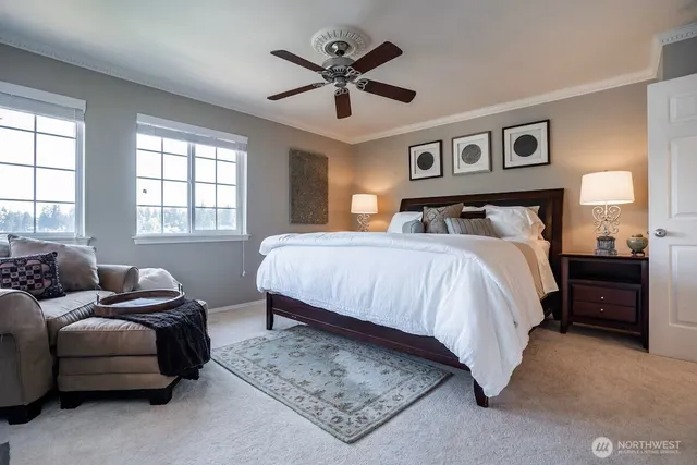 a bedroom with a bed furniture and a window