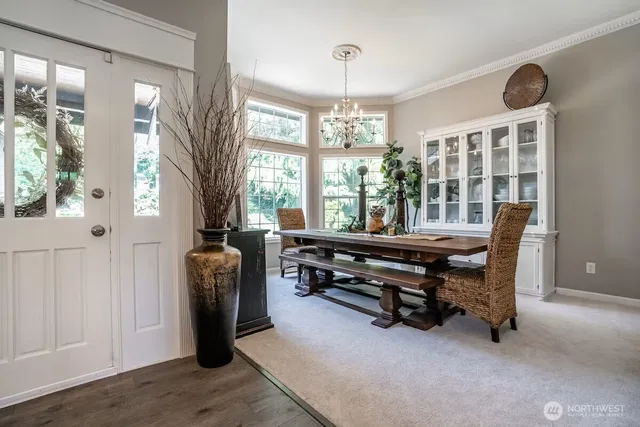 a view of a livingroom with furniture and windows