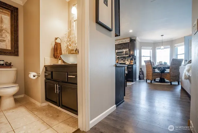 a view of living room with furniture and a flat screen tv