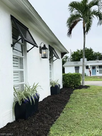 a view of a house with a garden