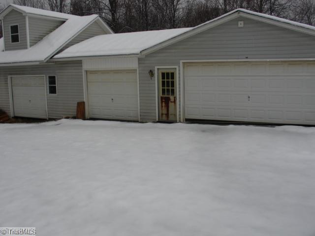 194 Linwood Road Stokesdale, NC 27357 - Photo 2 of 2 Parking Lot/Garage.