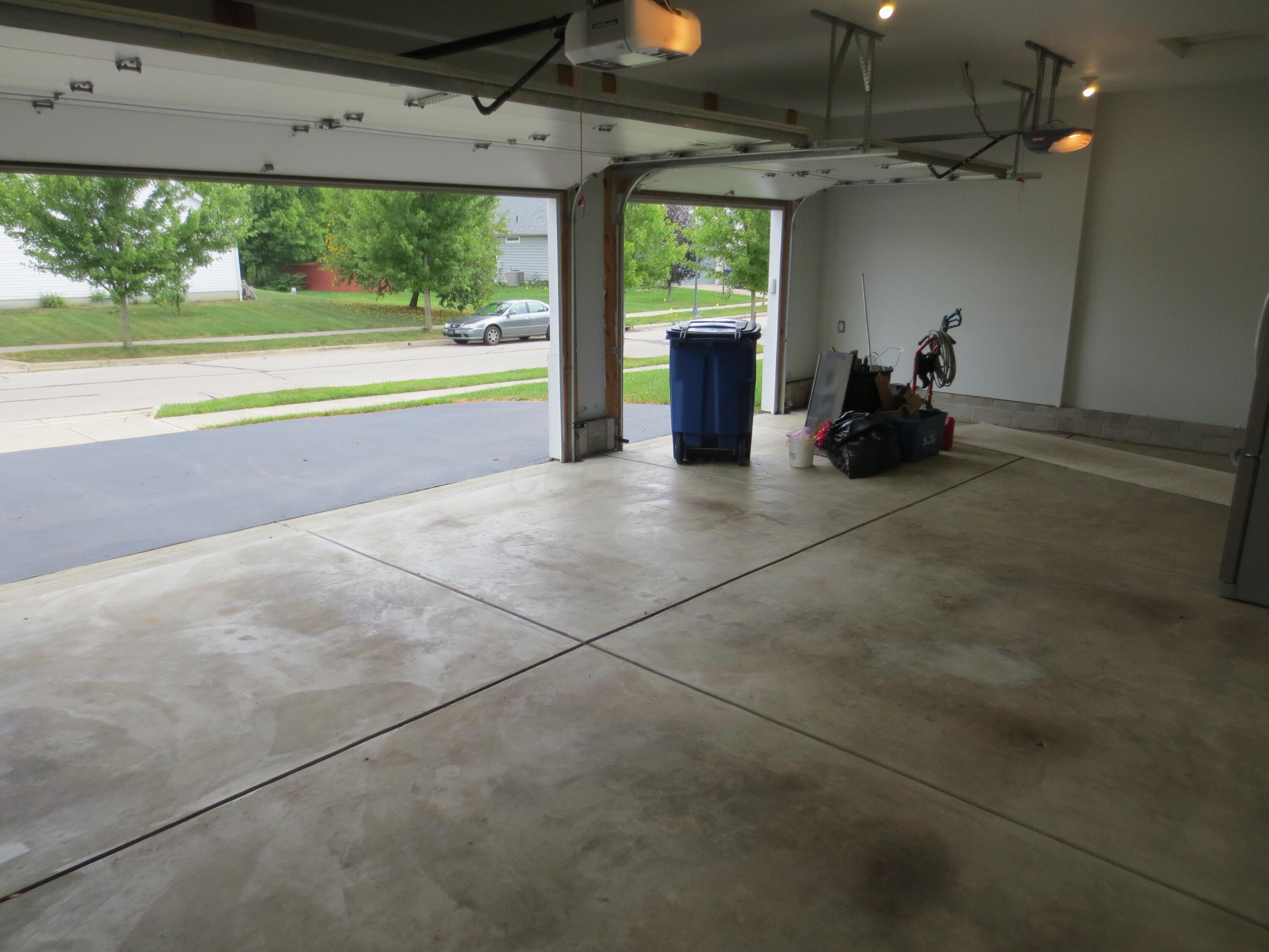 101 Merriston Circle Delaware, OH 43015 - Photo 32 of 34 Three car garage with openers
