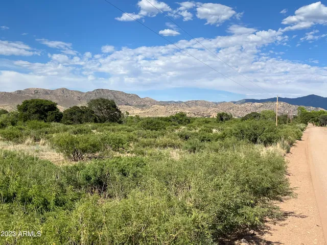 a view of a house with a mountain