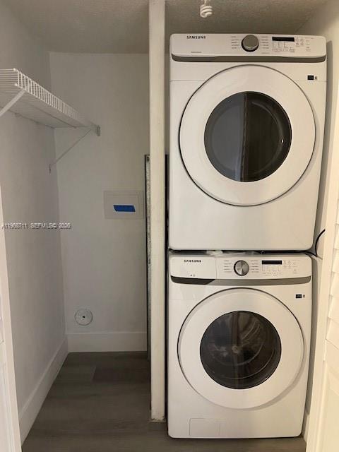 1852 Southwest 7th Street, Unit 203 Miami, FL 33135 - Photo 12 of 16 a utility room with dryer and washer