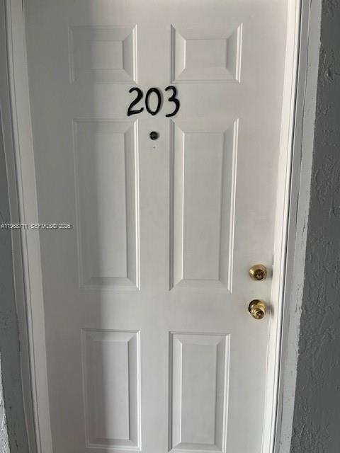 1852 Southwest 7th Street, Unit 203 Miami, FL 33135 - Photo 16 of 16 a bathroom with a mirror