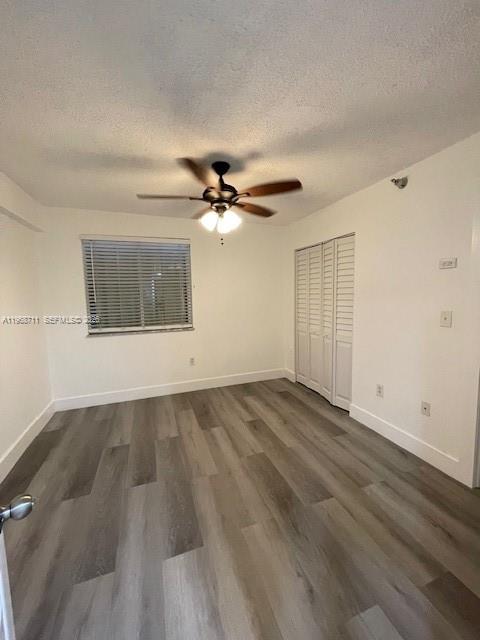 1852 Southwest 7th Street, Unit 203 Miami, FL 33135 - Photo 6 of 16 wooden floor in an empty room with a window