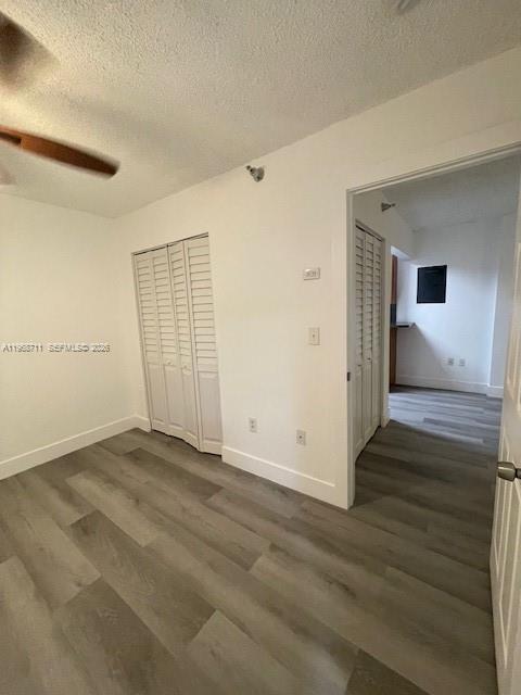 1852 Southwest 7th Street, Unit 203 Miami, FL 33135 - Photo 7 of 16 a view of an empty room with wooden floor