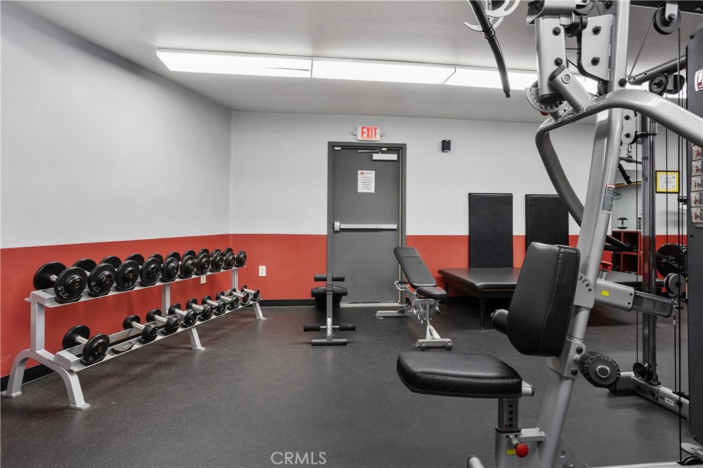 28121 Pebble Beach Drive Menifee, CA 92586 - Photo 31 of 35 a room with gym equipment