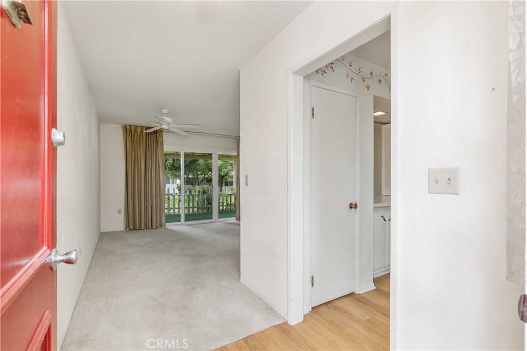 28121 Pebble Beach Drive Menifee, CA 92586 - Photo 6 of 35 a view of a big room with windows and entryway