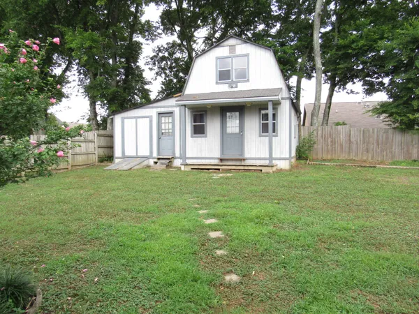 a house view with a garden space