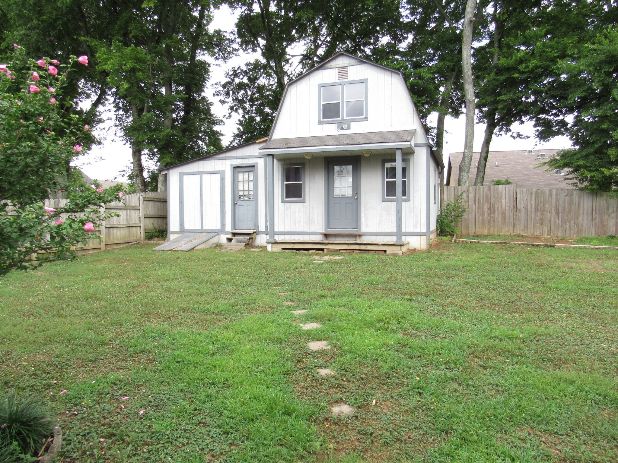 2027 Hidden Cove Road Mount Juliet, TN 37122 - Photo 23 of 25 a view of a house with yard
