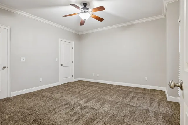 a bathroom with a granite countertop sink mirror and a shower