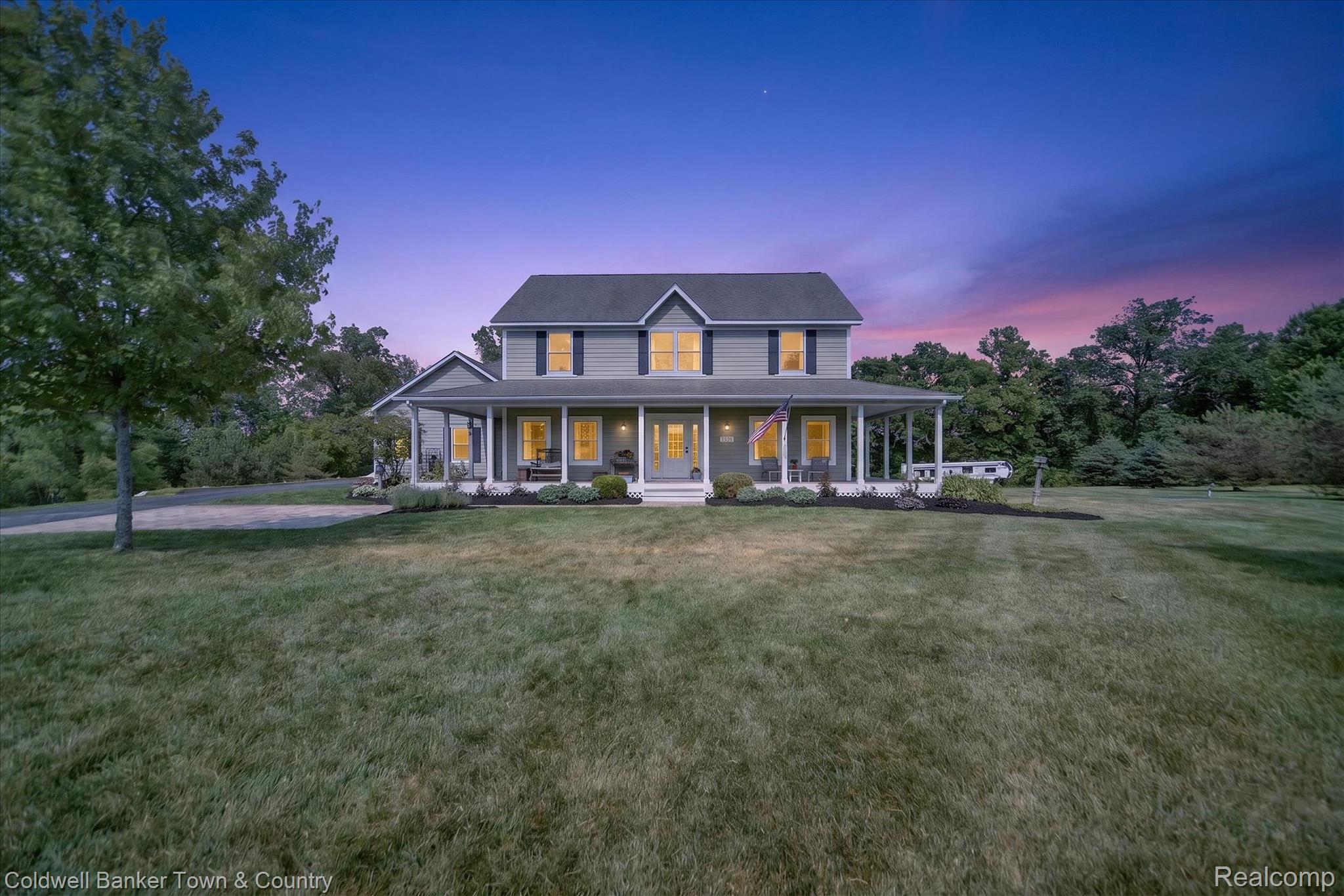 918 Gray Fox Court Howell, MI 48843 - Photo 80 of 84 Two-story residence featuring a broad wrap-around porch