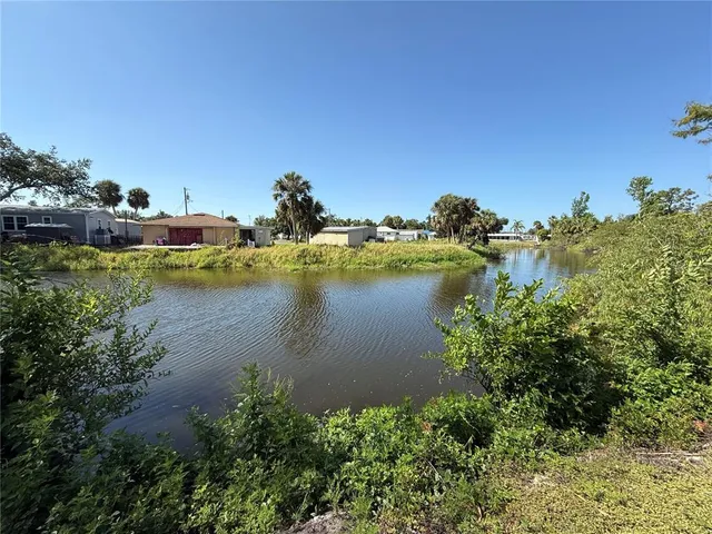 a view of a lake with houses