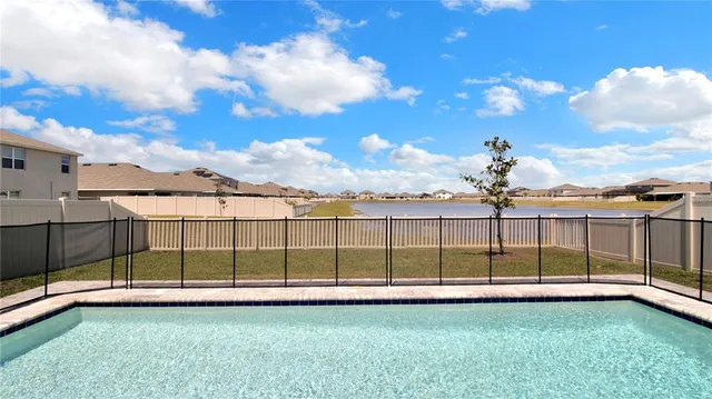 a view of a backyard with a garden