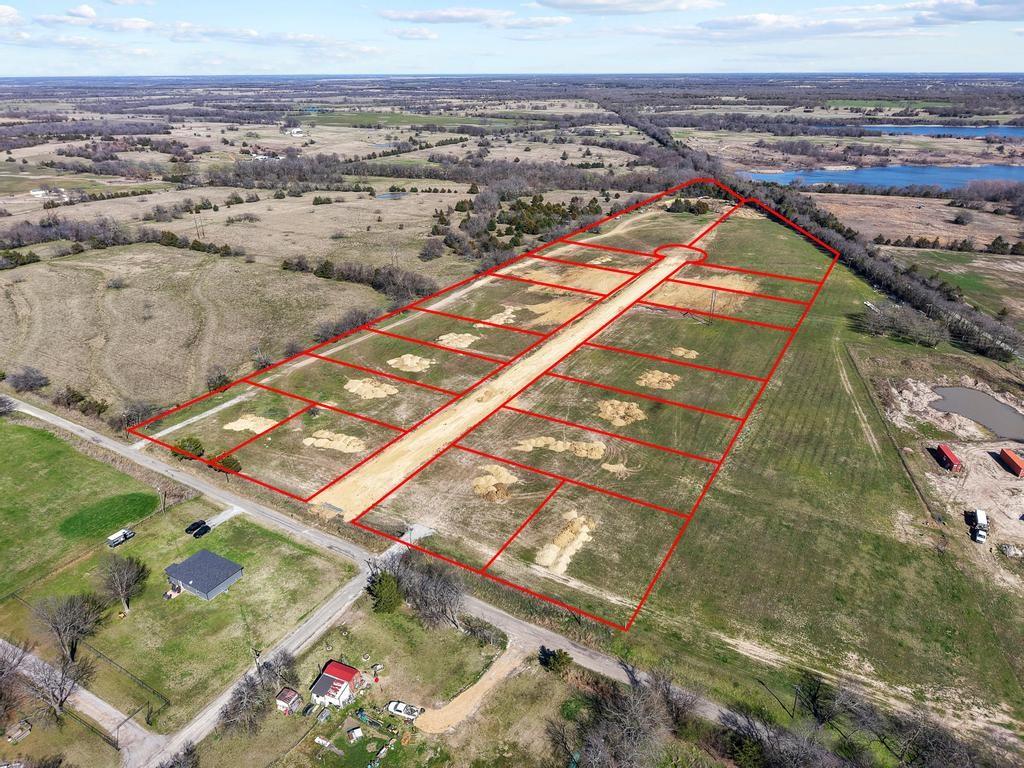 327 Roundtree Circle Wolfe City, TX 75496 - Photo 3 of 11 an aerial view of beach