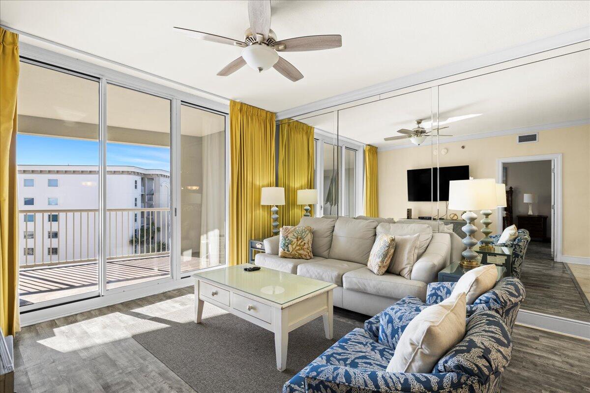 1150 Santa Rosa Boulevard, Unit 520 Fort Walton Beach, FL 32548 - Photo 6 of 25 a living room with furniture and a large window