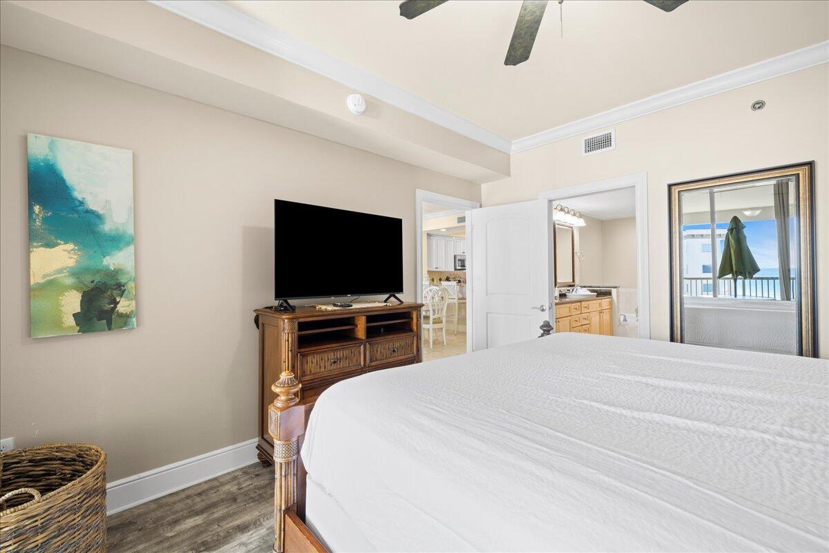 1150 Santa Rosa Boulevard, Unit 520 Fort Walton Beach, FL 32548 - Photo 10 of 25 a bedroom with a bed and a flat screen tv