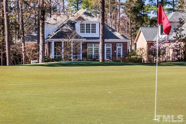 a view of a building with a swimming pool