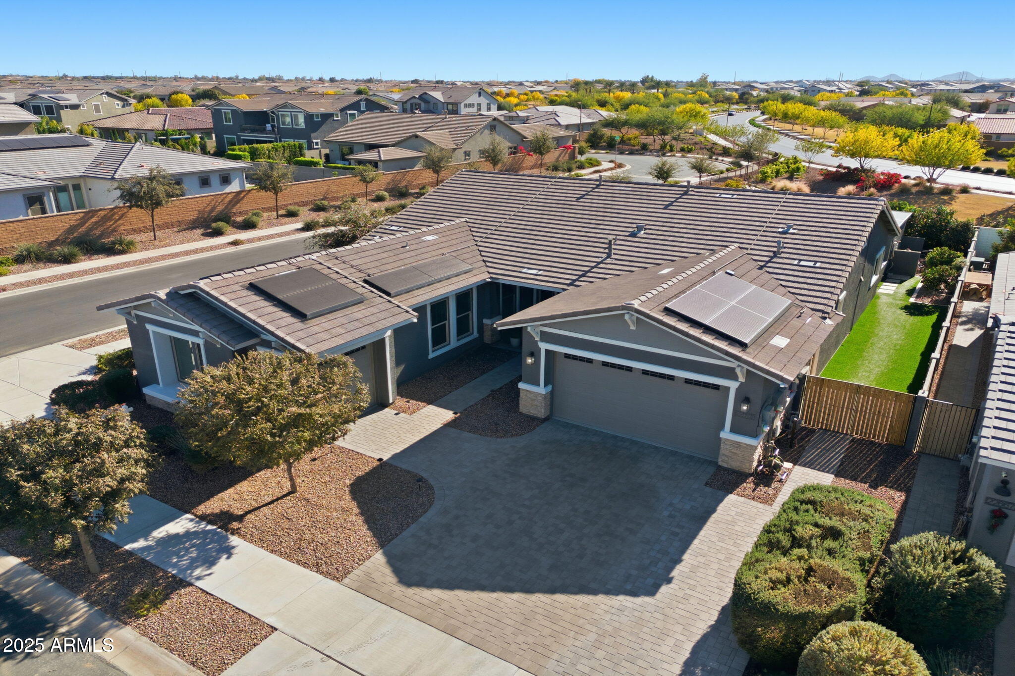 an aerial view of a house with a garden view