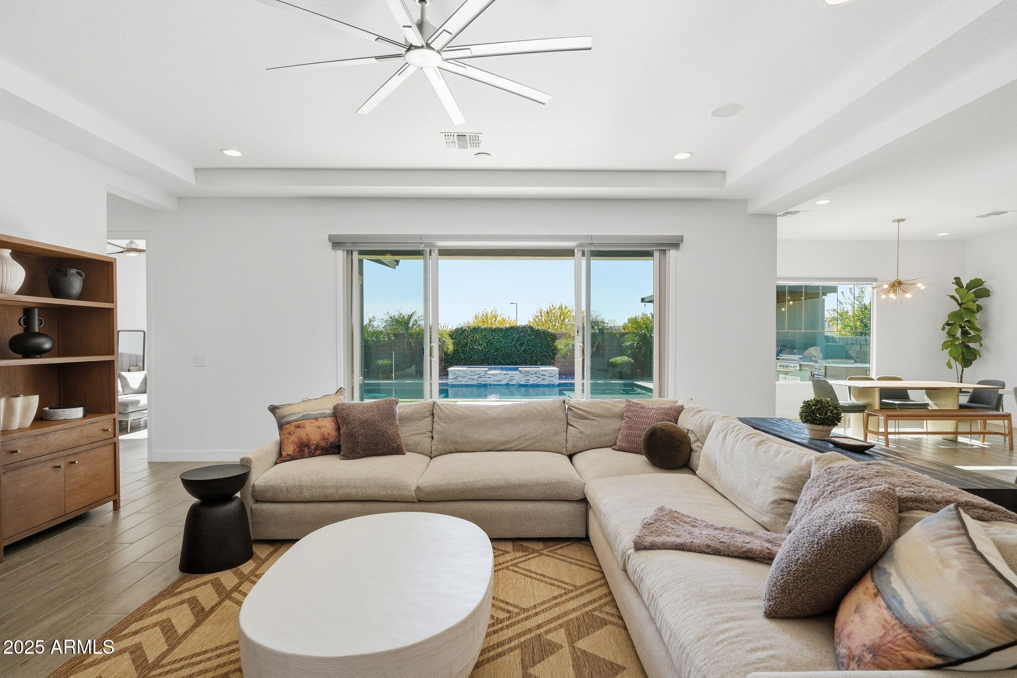 22679 East Russet Road Queen Creek, AZ 85142 - Photo 14 of 51 a living room with furniture and a large window