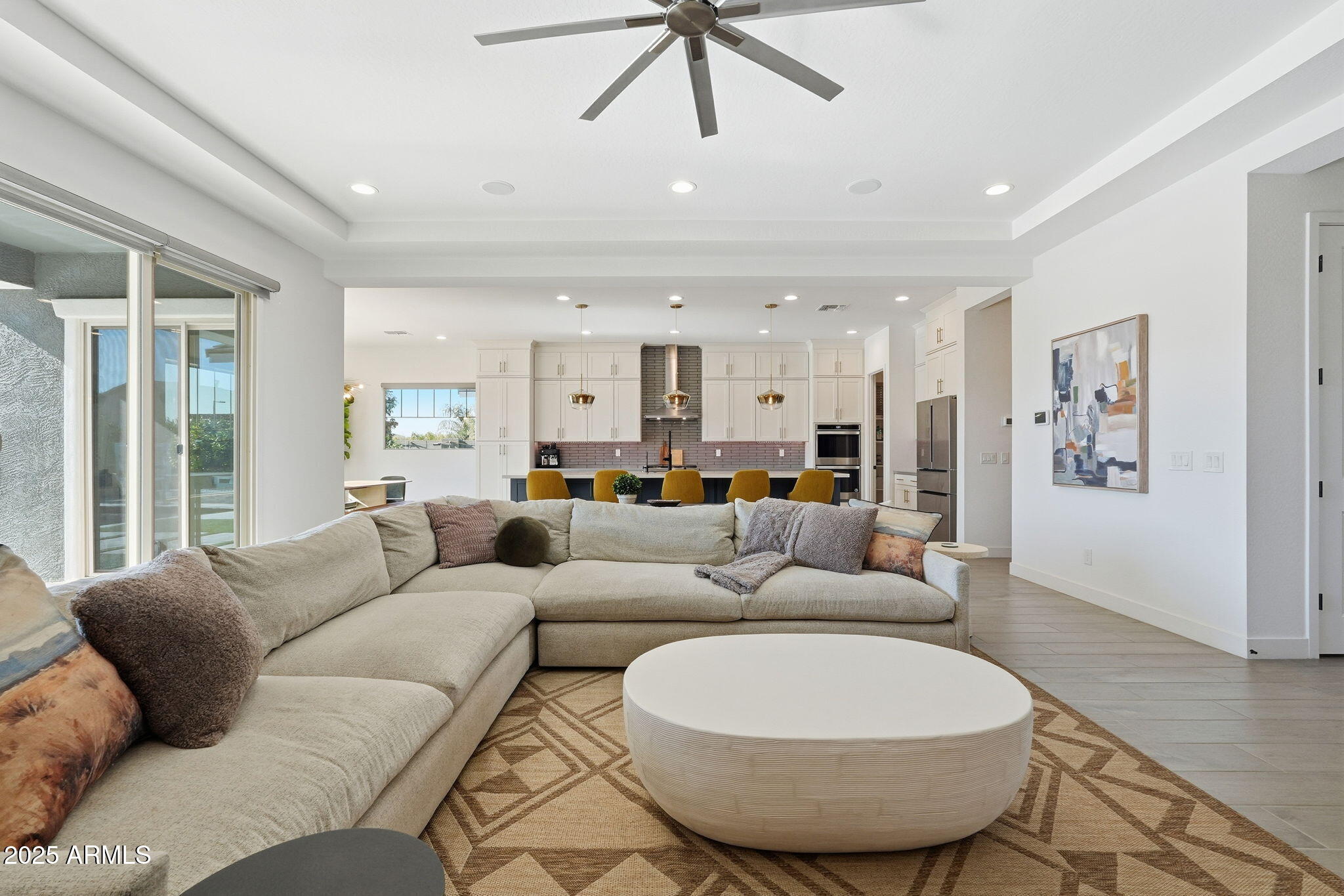 22679 East Russet Road Queen Creek, AZ 85142 - Photo 15 of 51 a living room with furniture and a large window