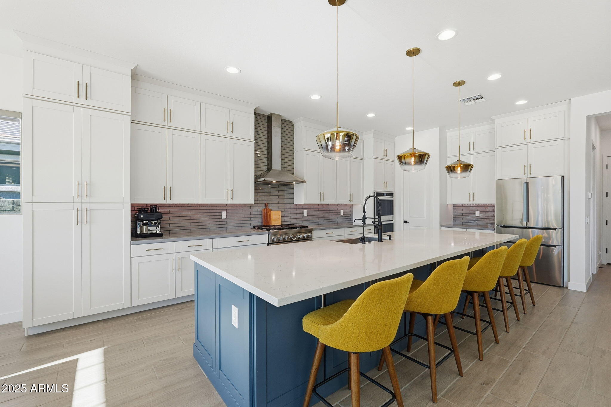 22679 East Russet Road Queen Creek, AZ 85142 - Photo 17 of 51 a large kitchen with a table and chairs