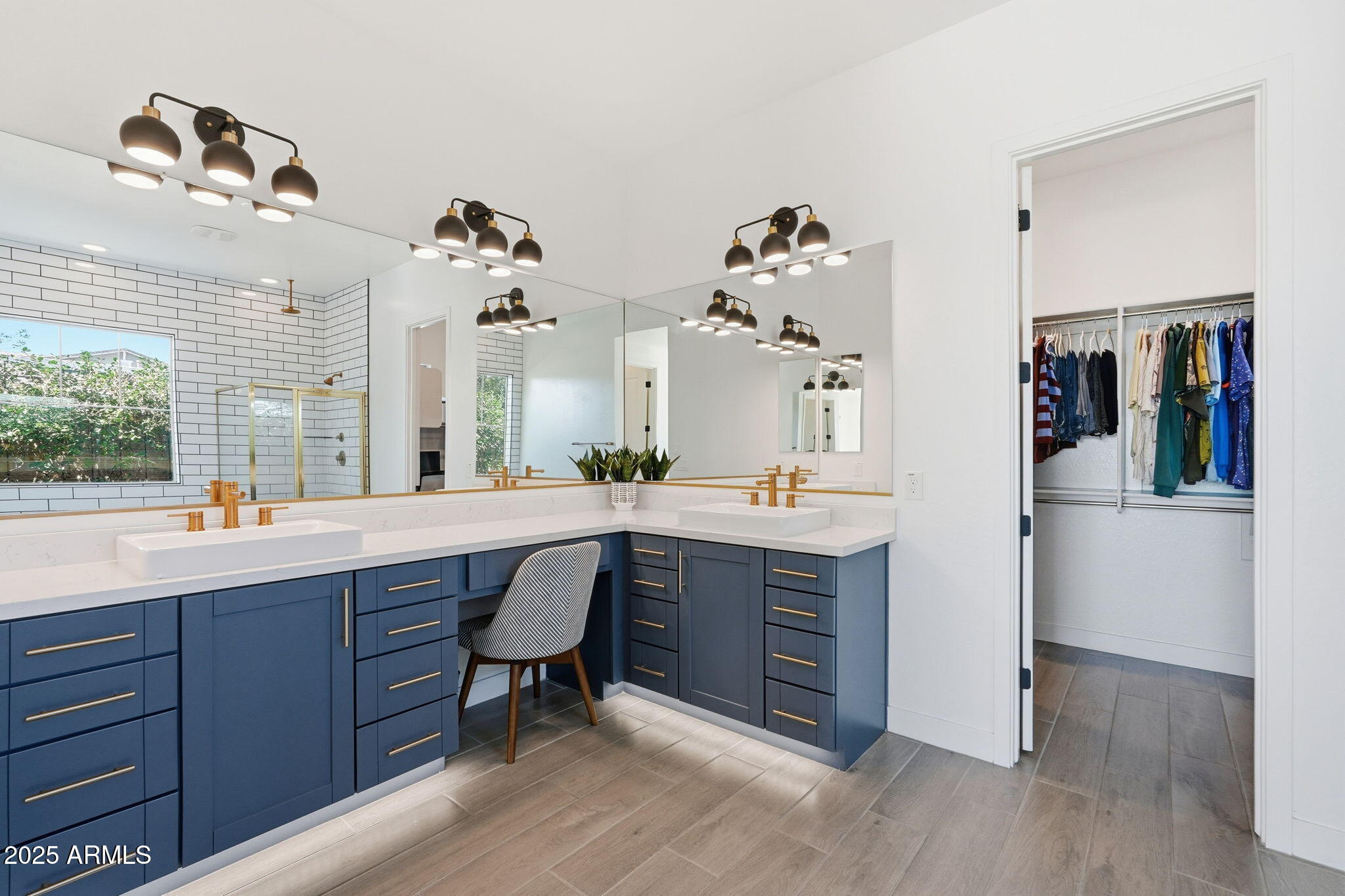 22679 East Russet Road Queen Creek, AZ 85142 - Photo 27 of 51 a spacious bathroom with a double vanity sink and a mirror