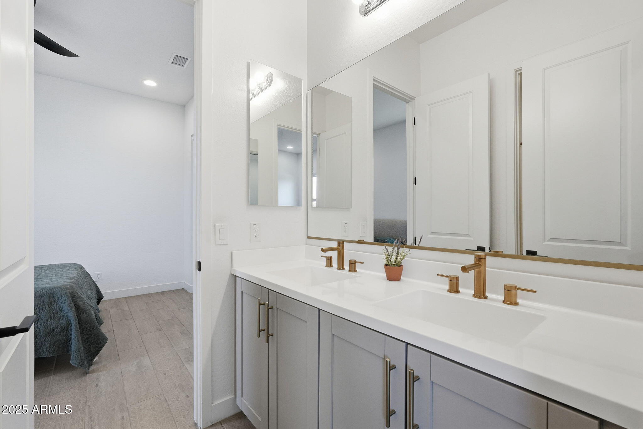 22679 East Russet Road Queen Creek, AZ 85142 - Photo 36 of 51 a bathroom with a sink and a mirror