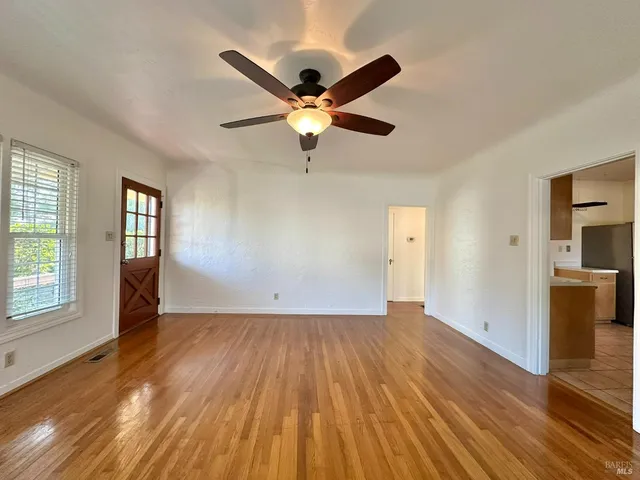 a view of an empty room and window