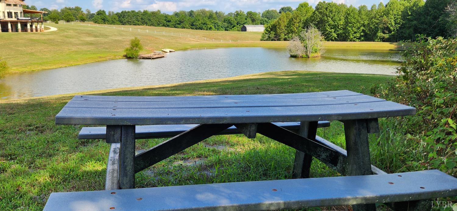 25 Riley Run Road Forest, VA 24551 - Photo 19 of 34 a view of a wooden deck and a lake view