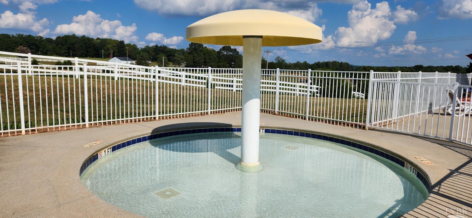 25 Riley Run Road Forest, VA 24551 - Photo 25 of 34 a view of a balcony with a swimming pool and outdoor space