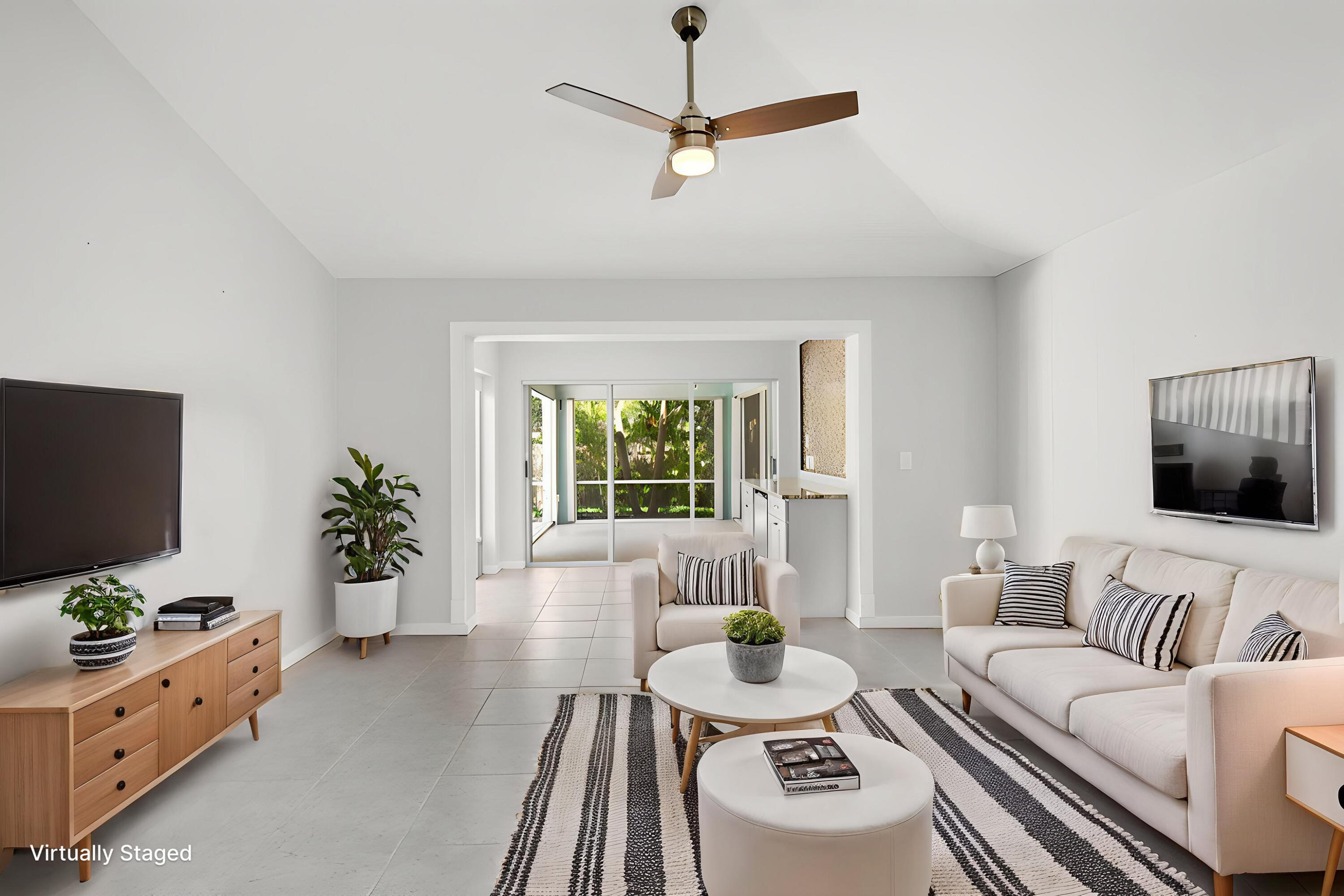 1959 Northwest Marsh Rabbit Lane Jensen Beach, FL 34957 - Photo 12 of 46 Virtually Staged Family Room