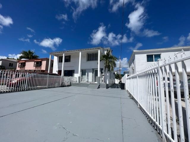711 85th Street Miami Beach, FL 33141 - Photo 1 of 7 a view of a porch with a patio