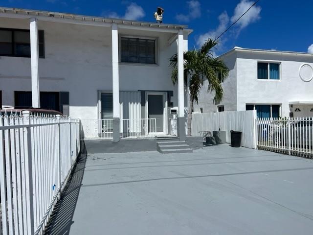711 85th Street Miami Beach, FL 33141 - Photo 3 of 7 a view of a house with a balcony