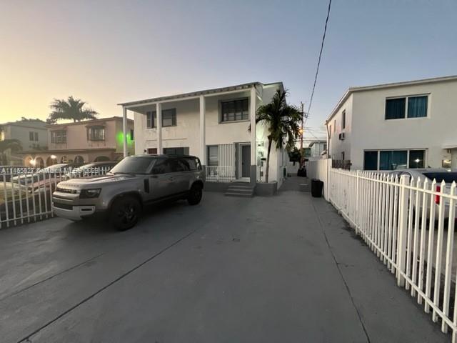 711 85th Street Miami Beach, FL 33141 - Photo 4 of 7 a view of a house with car parked