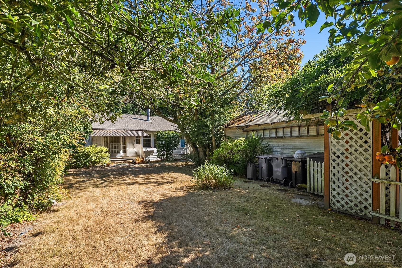 5202 35th Avenue Southwest Seattle, WA 98126 - Photo 11 of 32 a view of a house with a yard