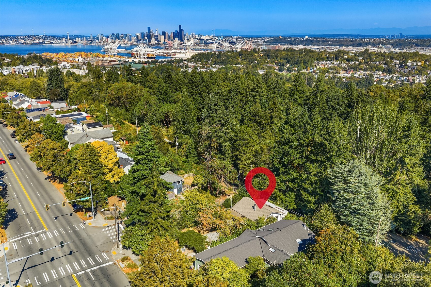 5202 35th Avenue Southwest Seattle, WA 98126 - Photo 6 of 32 an aerial view of residential houses with outdoor space and swimming pool