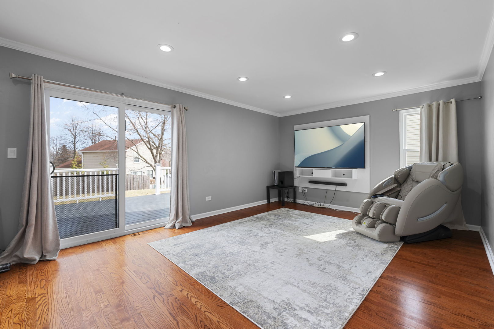 4599 Mumford Drive Hoffman Estates, IL 60192 - Photo 12 of 25 a living room with furniture and a window